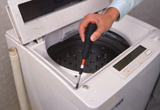 洗濯機の高圧洗浄・外した部品を元通りに組み立てます。